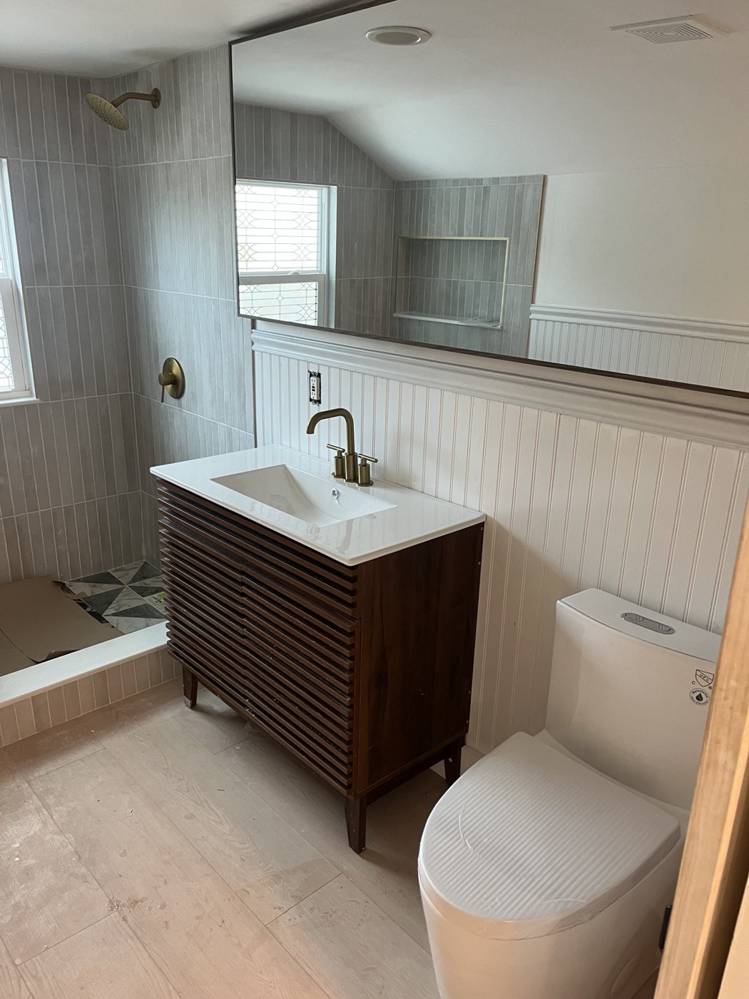 Bathroom vanity and plumbing installation